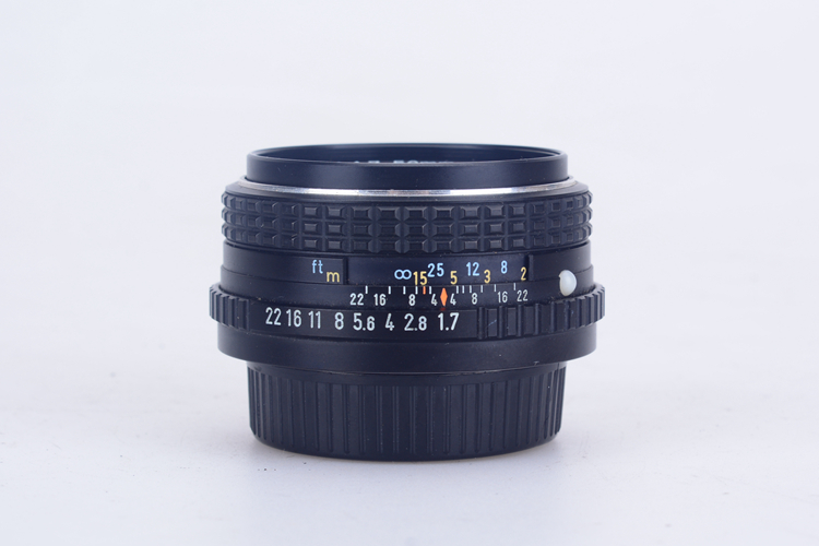 The Pentax SMC M50 1.7 M SMC PENTAX M 50 1.7 PK port manually focuses the large aperture lens