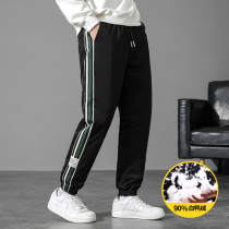 2021 Winter new foot down pants men thick warm outside wear fashion student trousers men handsome cotton pants tide