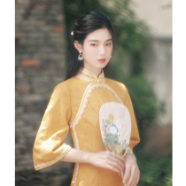 Yellow ancient method inverted big sleeve cheongsam 2021 New retro Republic of China young girl improved dress autumn and winter