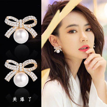 Hong Kong simple pearl pendant earrings super exaggerated personality temperament Joker 925 silver pin bow earrings female