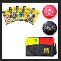 Referee supplies red and yellow cards pick side money whistling flag captain armband football match referee patrol flag