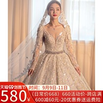 Long sleeve main wedding dress bride 2021 New Big trailing shoulder Starry Sky V collar French heavy industry female court