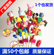 Hot sale childrens toys stall temple fair supply pure wood puppet shaking drum hand colorful cartoon wooden rattle