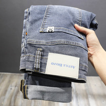 Super texture comfortable fabric autumn and winter gray blue jeans men Korean slim foot pants high-end Tide brand trousers