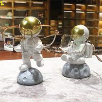 Optics shop decoration decoration creative bracket modern simple astronaut display rack desktop storage decoration mobile phone