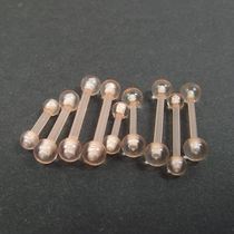 Two flesh-colored yellow skin stealth student ear nail ear bar nail ear hole ear bone nail