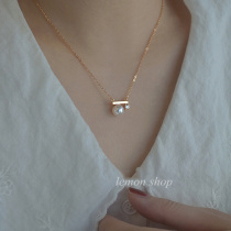 Korean high-end design sense balance wood pearl necklace female summer collarbone light luxury 2021 style foreign style versatile