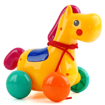 Infants and young children drag and pull the line duckling can pull the rope Toddler toy to pull the baby to learn to walk The girl rings the bell