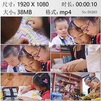 Young mother takes care of two children at home and takes children to draw and read high-definition video material