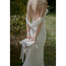 Light wedding dress 2021 new sexy backless travel photo satin wedding wedding go out welcome gauze fishtail skirt sling dress