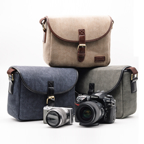 Retro waterproof camera bag photography bag SLR shoulder bag for Sony Konka can canvas micro single cross-body men and women
