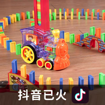  Vibrato puts dominoes on the train electric automatic cards boys childrens educational toys net red building blocks