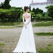 (White Xiaoxian) light wedding dress 2021 New Moren series simple suspenders to go out of the sea beach travel tailing tail dress