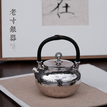 Silver pot small teapot sterling silver 999 brew teapot home foot silver tea set Yunnan pure handmade teapot chicken blood vine lifting beam
