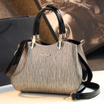Hong Kong I Tgreg new simple atmosphere portable big bag middle-aged womens bag mother bag leather shoulder shoulder bag