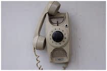 Old-fashioned dial wall-mounted telephone old objects collection film and television props nostalgic bar photo studio cabinet decoration decoration