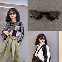Childrens glasses 2023 new European and American boomers fashion walking show performance accessories girls UV-proof triangular sunglasses