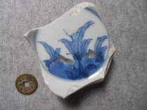 Old porcelain specimen Qing Kangxi Blue and white glaze red flower grass pattern bowl