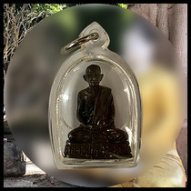 Thailands characteristic dragon Dama Hapo Temple sits on its own small model with a shell without a card