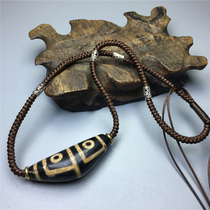 The new Tibetan four-eyed horn calcified old Dzi necklace pendant agate chalcedony ethnic style