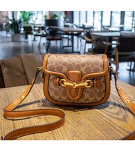 Hong Kong IT niche design fashion fashion leather pet round saddle bag shoulder messenger bag