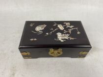 A rosewood shell mandarin duck lotus figure dressing box