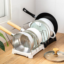 The kitchen puts various pots of shelves stainless steel pots saucers saucepans shelves small and multi-layered