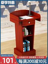 The podium is simple and fashionable the lecture table is held. The floor teachers speech meeting is hosted by the luxury reception sales department.