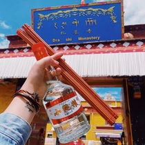 Tibet Lhasa Zaki Monastery offers Hada to offer wine to the god Zakiram on the incense to pray for blessings and brush gold for blessings