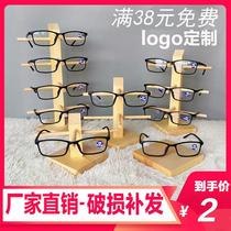 Upscale glasses display shelves storefront display containing putting decoration props desktop hanging sun myopia eye shelf