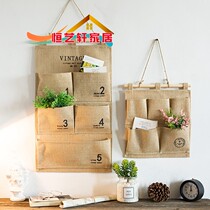 Creative cotton linen fabric dormitory artifact Bedroom small storage hanging bag Door back wall hanging finishing storage bag Multi-layer