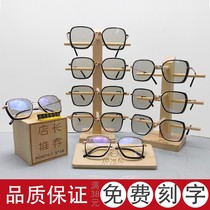 Putting up a wall art Peoples head sunglasses sunglasses Sunglasses Show Windows Display Glasses Store Wall Decorative Props