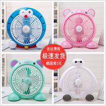 On the bed of the bed the upper berth and lower bunk the student dormitory the bedside small ceiling fan the summer electric fan
