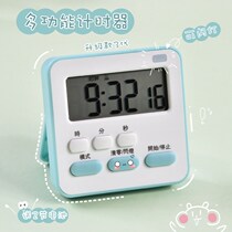 Student uses timer alarm clock to learn the special reminder electronic time management timer for child writing homework