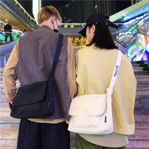 Messenger bag mens ins tide brand large-capacity Japanese wild college students class canvas shoulder bag womens commuter schoolbag