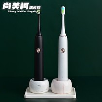 Electric toothbrush holder Japanese diatom mud suction pad table top creative non-perforated toothbrush base holder set