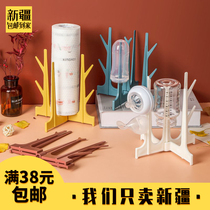 Xinjiang home creative tissue rack bottle drain rack bedroom restaurant roll paper jewelry key holder rack