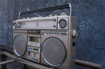 Old-fashioned classic red light large tape recorder antique cassette machine collection nostalgic film and television collection bar props display