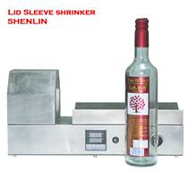 Red wine bottle rubber cap shrink machine bottle cap cover film shrink machine wine bottle trademark shrink machine Shenzhen rubber cap shrink