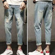 Trend Korean version of ripped jeans mens nine-point small pants mens spring summer and autumn beggar pants mens nine-point ripped pants mens nine-point ripped pants Mens nine-point ripped pants Mens nine-point