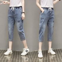 Korean large size 200kg fat sister elastic waist denim Capri pants female summer high waist loose embroidered Haren pants
