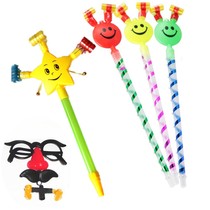 Childrens big laughs face blow and blow a dragon whistles birthday sends a small gift for a toy gift-giver