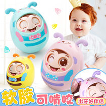Tumbler baby rocking a bell crawling toy with a bell and a cartoon in the blink of an eye and a baby newborn baby can nibble