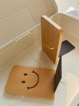 Desktop storage is both a book stand and an ornament-cute smiling face solid wood makes a beautiful texture