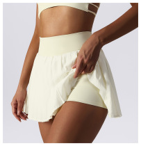 Sports short skirt female summer hot girl irregular cross bottoms anti-light A-line high waist pleated skirt tennis badminton