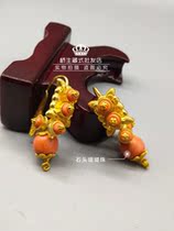 The new Qiaosheng Tibetan style earrings are inlaid with pink stone beads that do not fade Nepalese gold-plated material