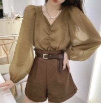 V-collar Tucker top female autumn 2021 new design sense niche thin fold waist long sleeve shirt