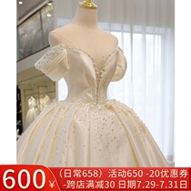 Satin main wedding dress bride 2021 new temperament trailing princess court French light out yarn one shoulder