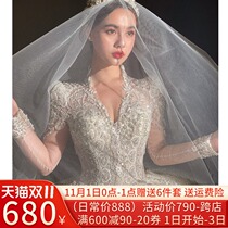 Long sleeve main wedding dress bride 2021 new big tailing female star V collar French light and heavy work Winter Court
