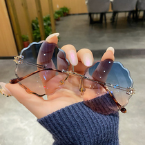 2021 new European and American cutting edge new frameless sunglasses flowers net red stars ink mirror female anti-UV rays